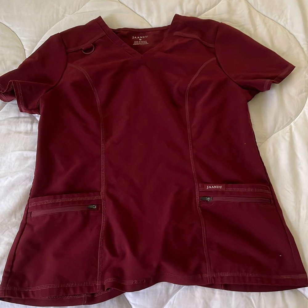 Wine colored Jaanuu medium scrub top